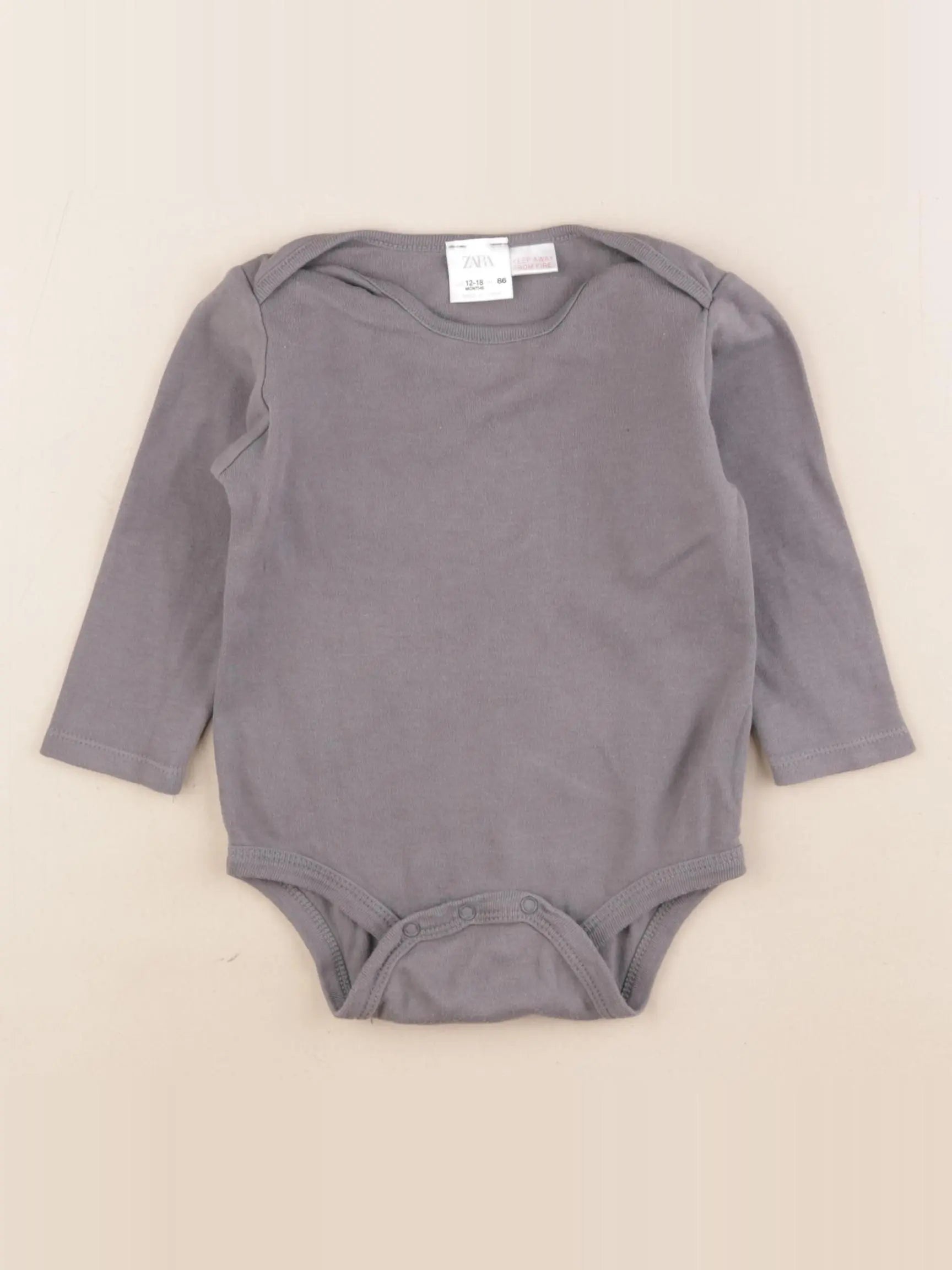 Zara - body gris - 12/18 mois