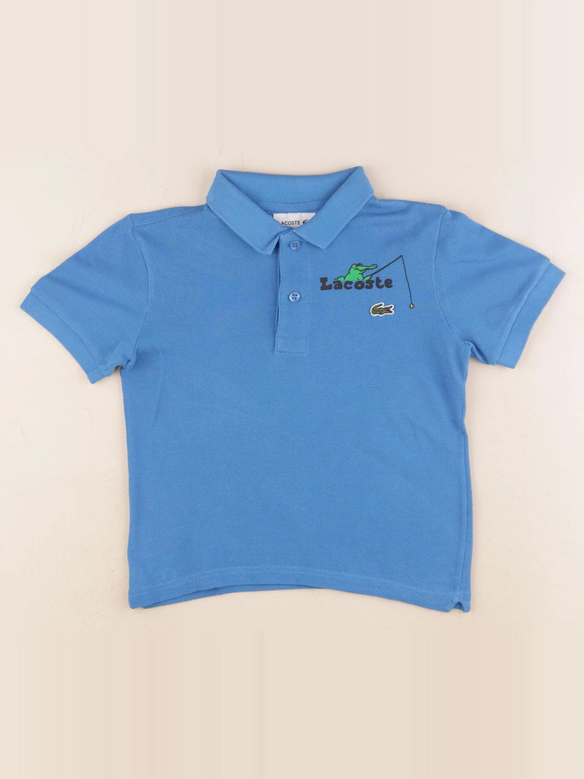 Lacoste - polo bleu - 4 ans
