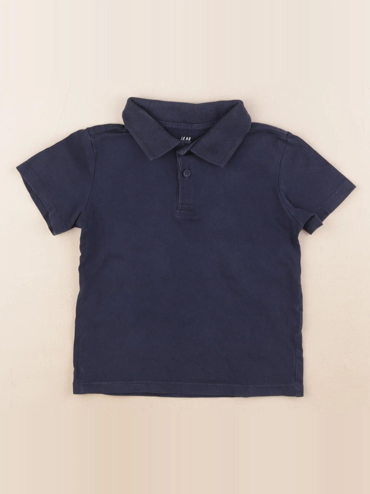 H&M - polo bleu - 2/4 ans