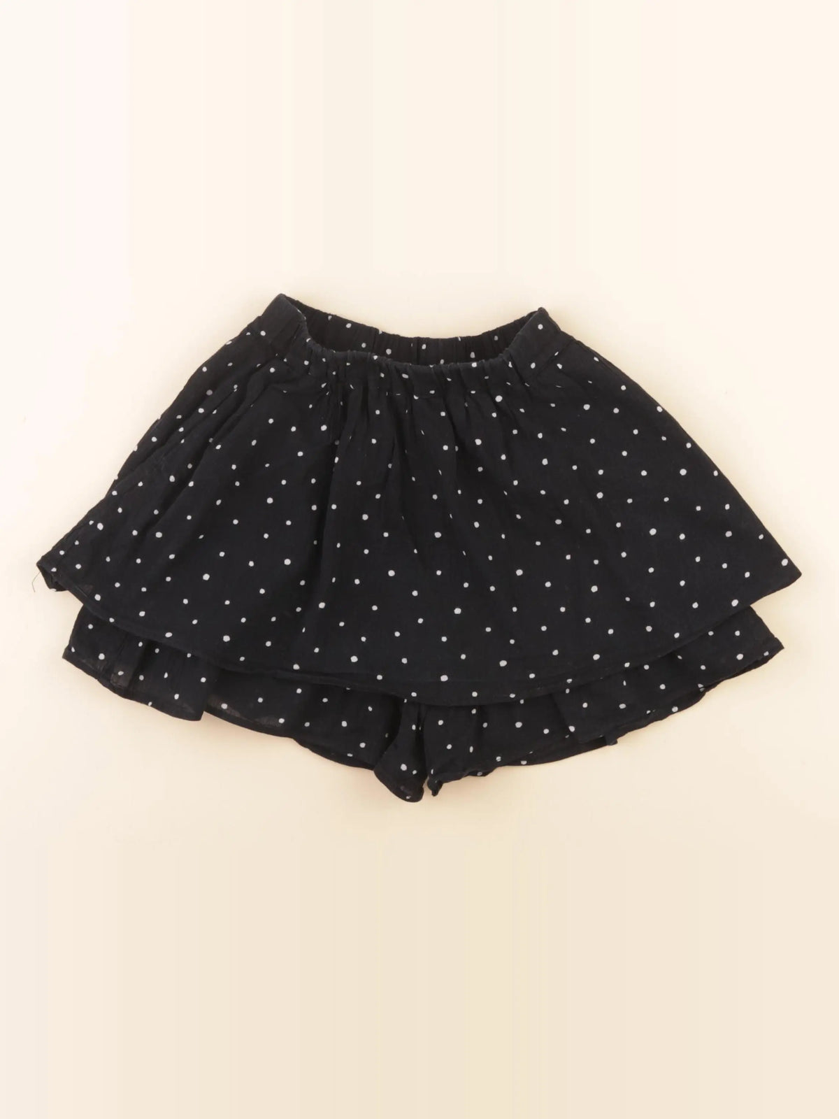 Uniqlo - jupe short noir - 3/4 ans