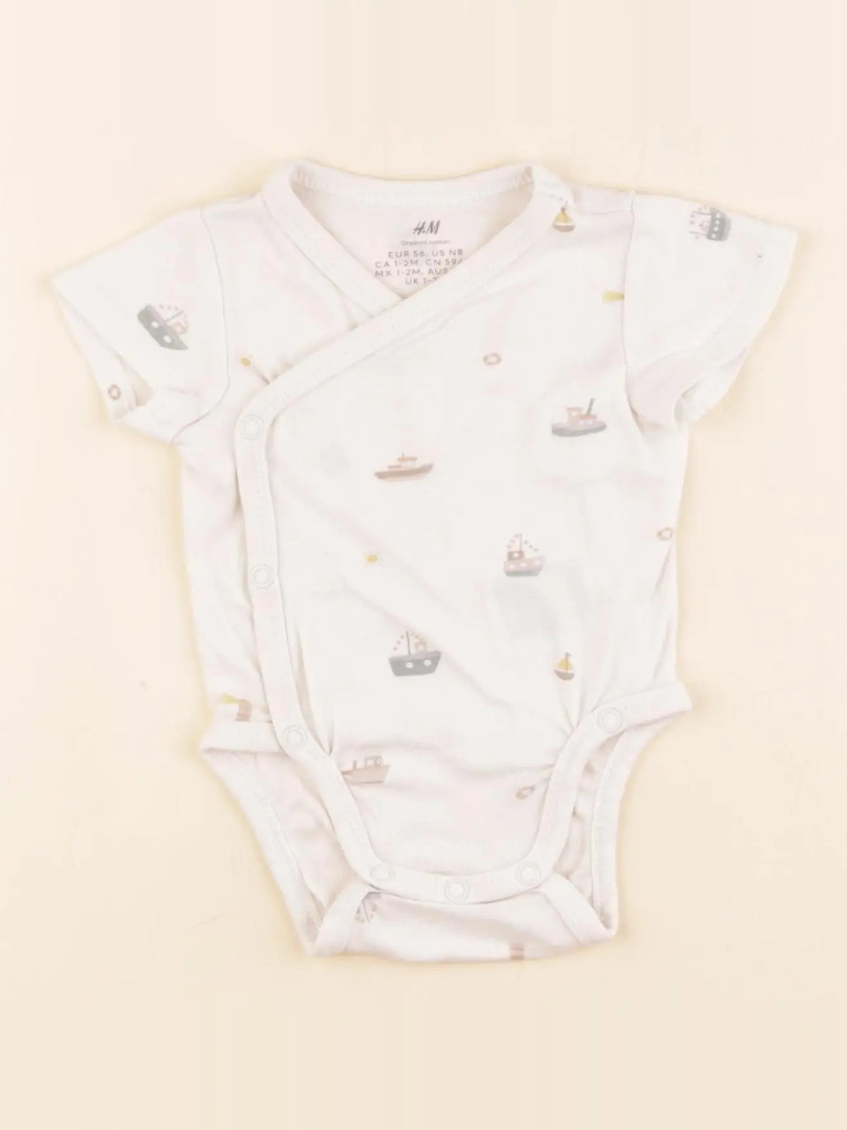 H&M - body beige - 1/2 mois