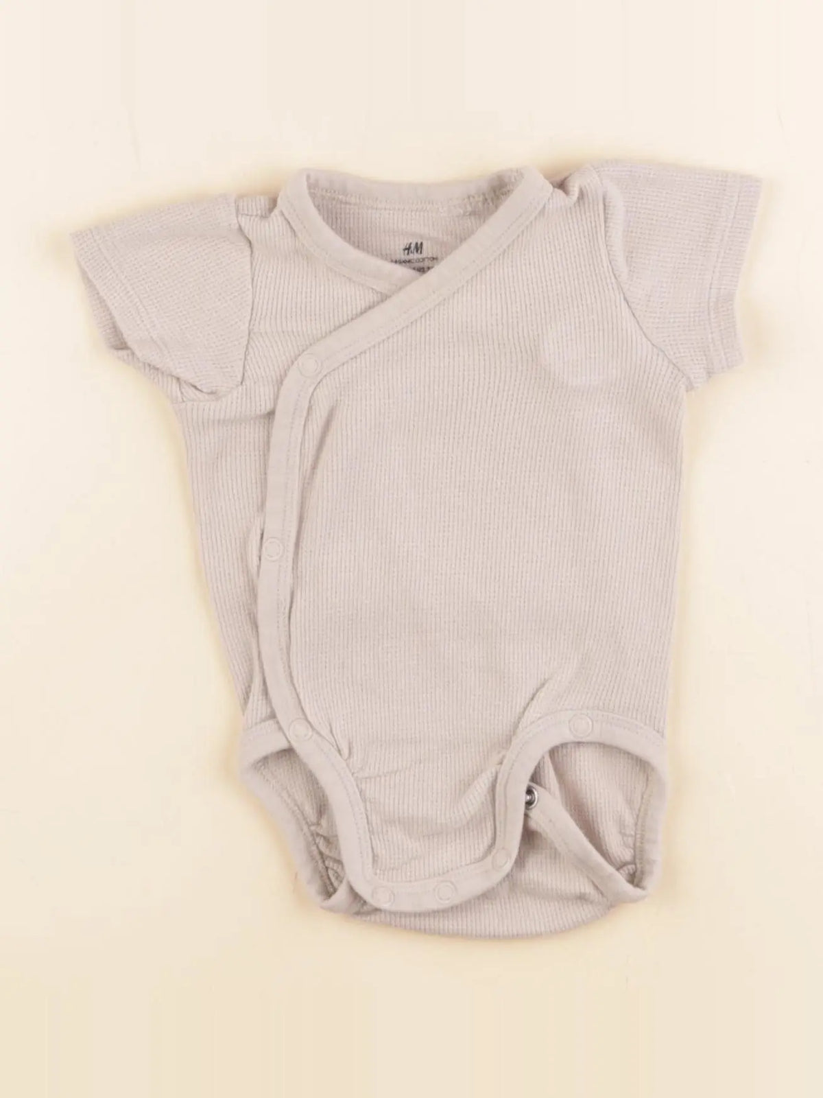 H&M - body beige - 2/4 mois