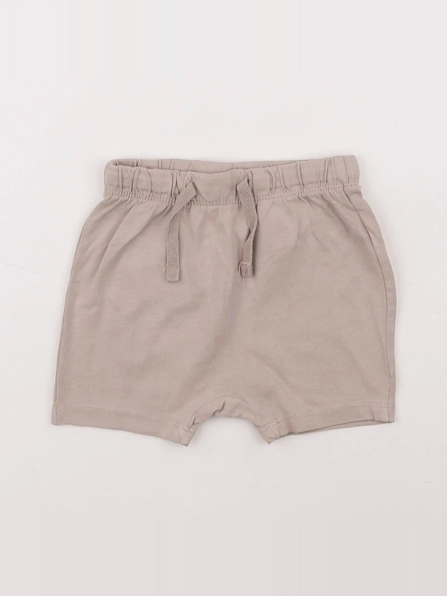 H&M - short beige - 6 mois