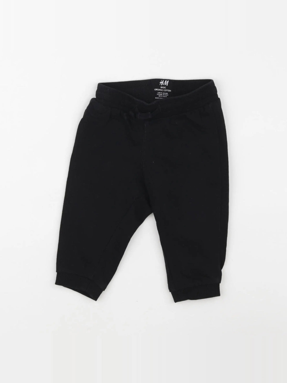 H&M - jogging noir - 6/9 mois