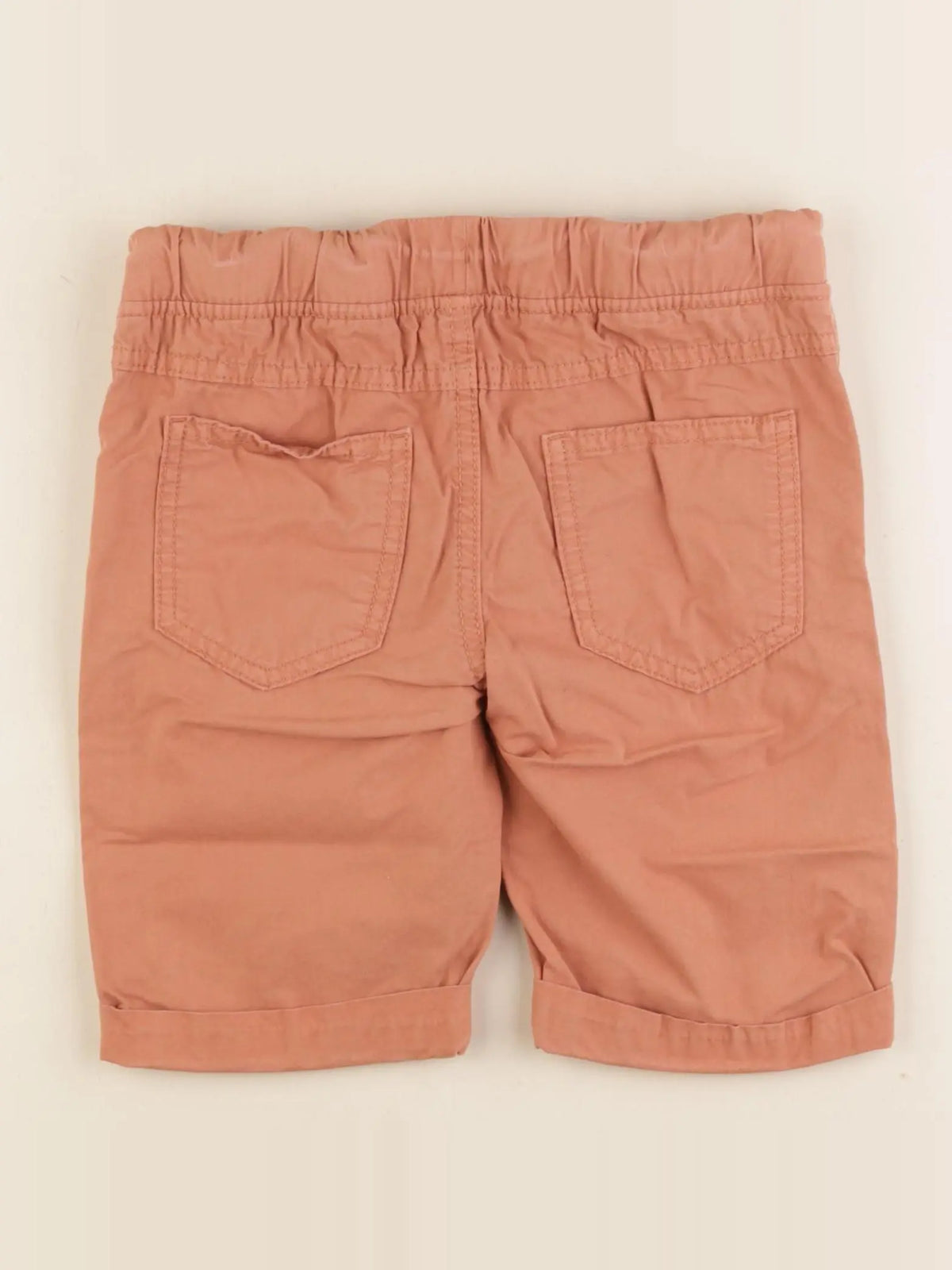 Vertbaudet - short orange - 7 ans