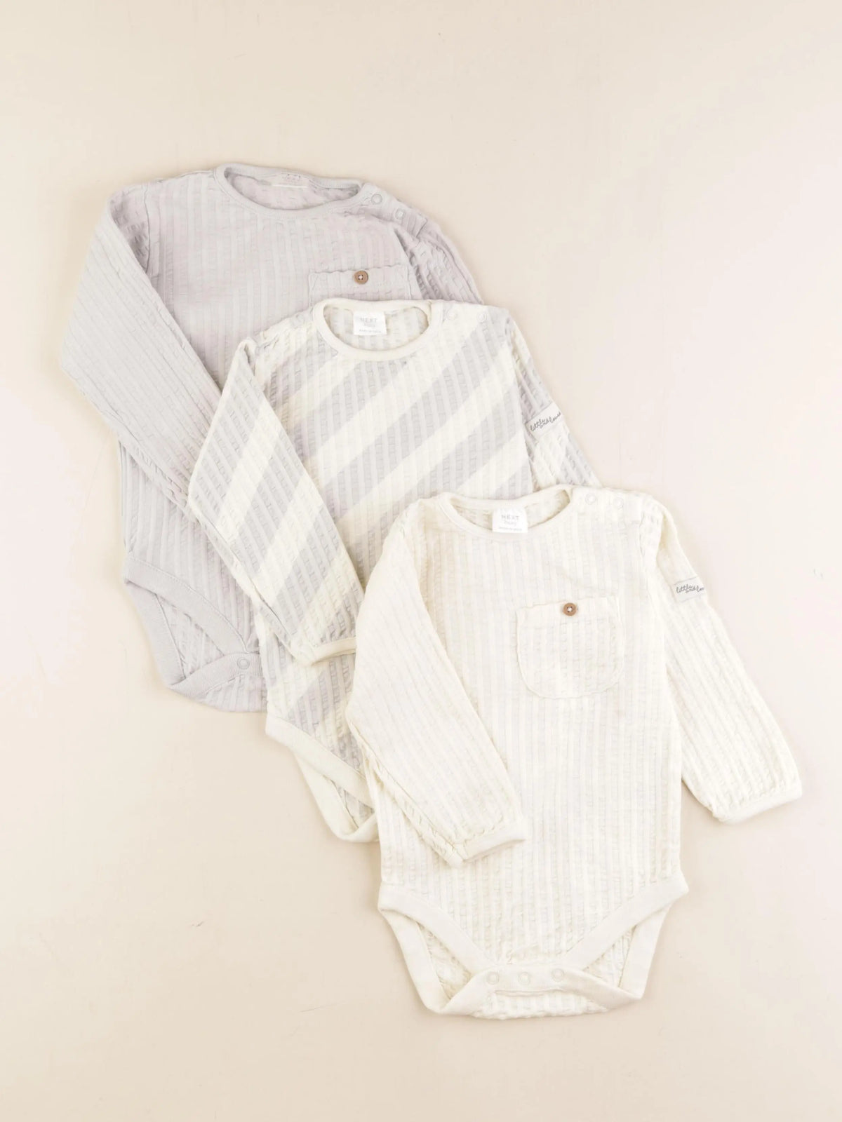 Next - lot de 3 bodies en coton multicolore - 9/12 mois