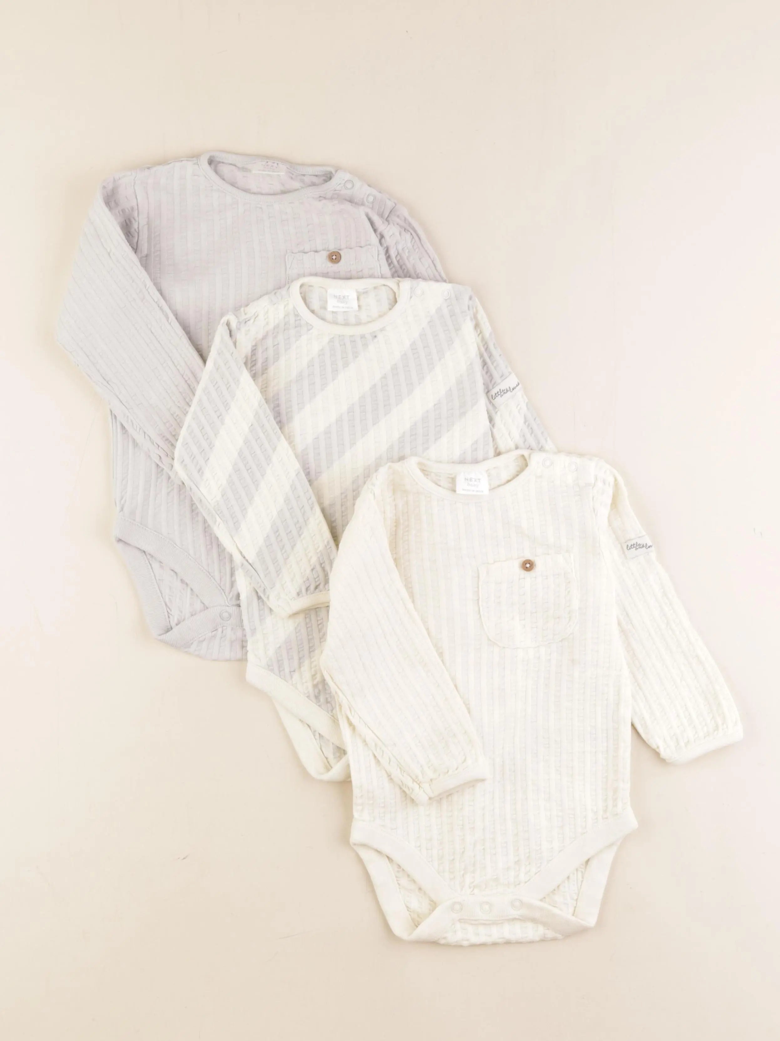 Next - lot de 3 bodies en coton multicolore - 9/12 mois