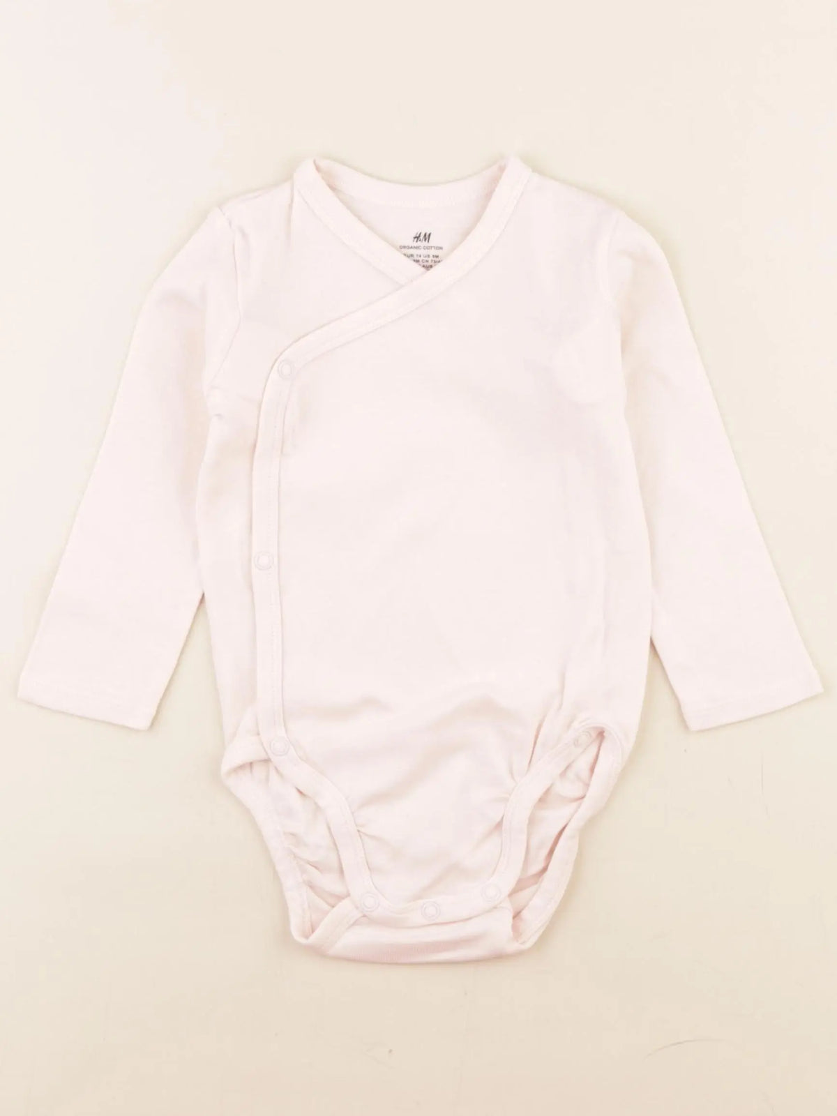 H&M - body rose - 6/9 mois