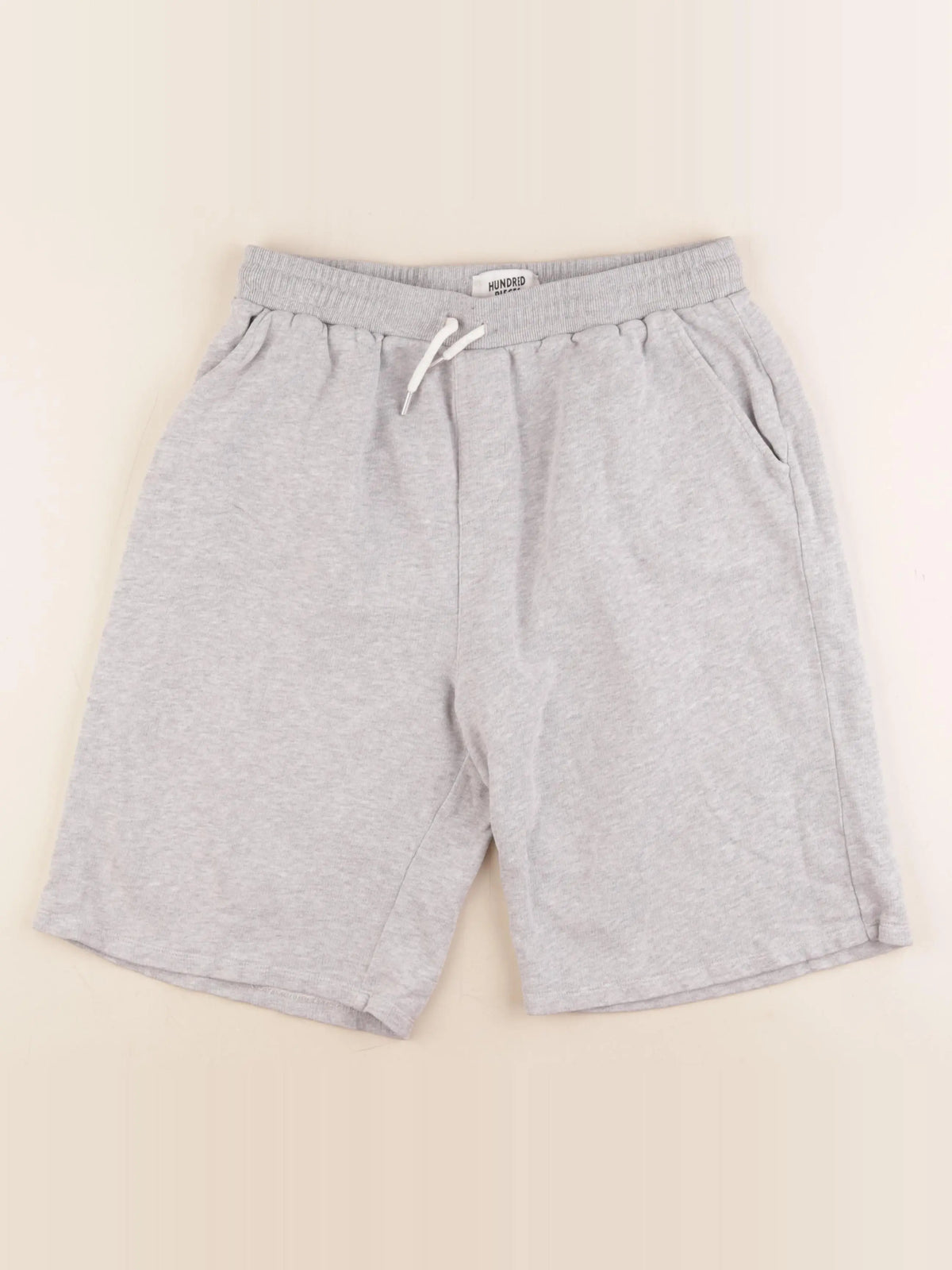 Hundred Pieces - short gris - 14 ans