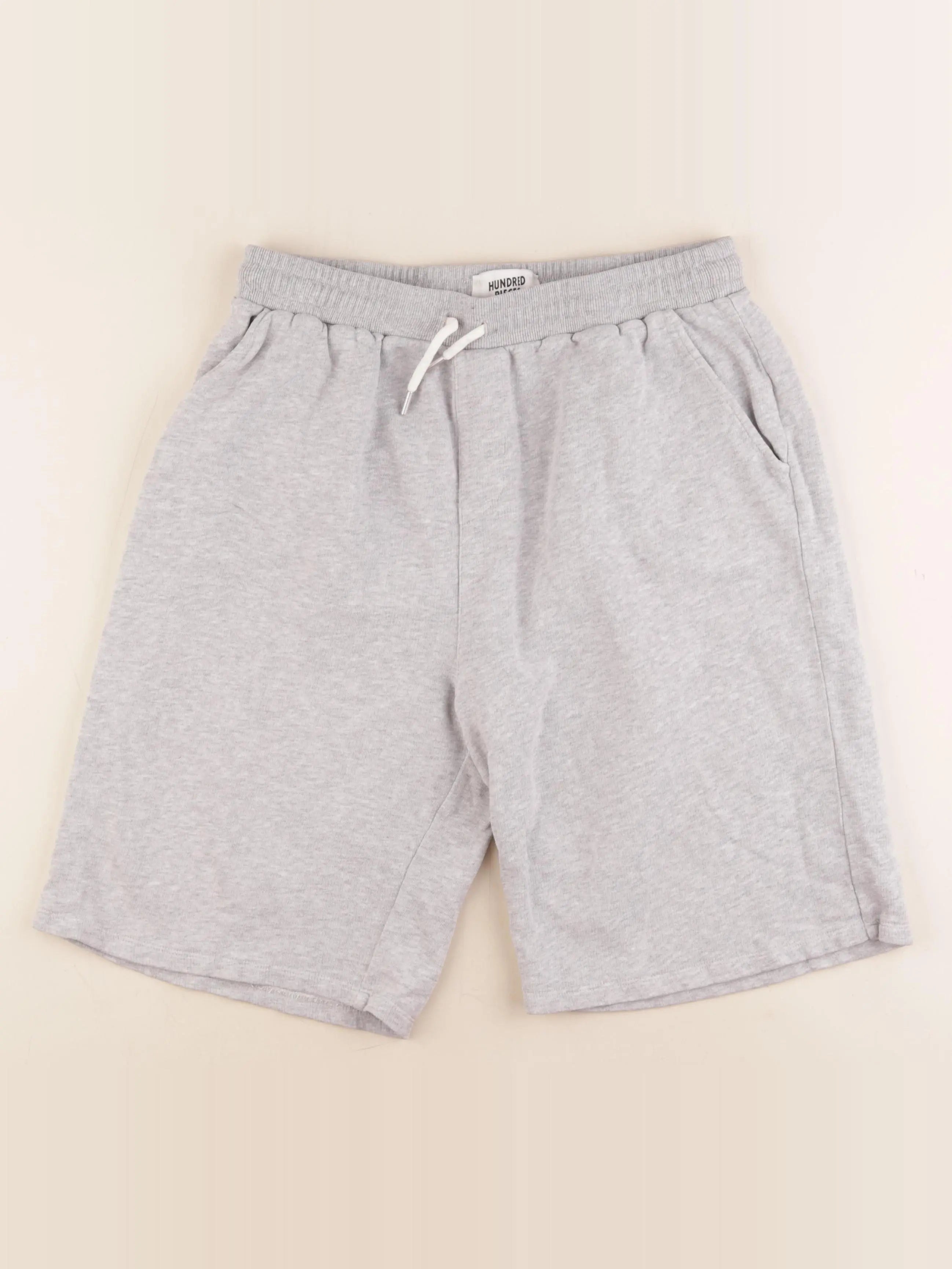 Hundred Pieces - short gris - 14 ans