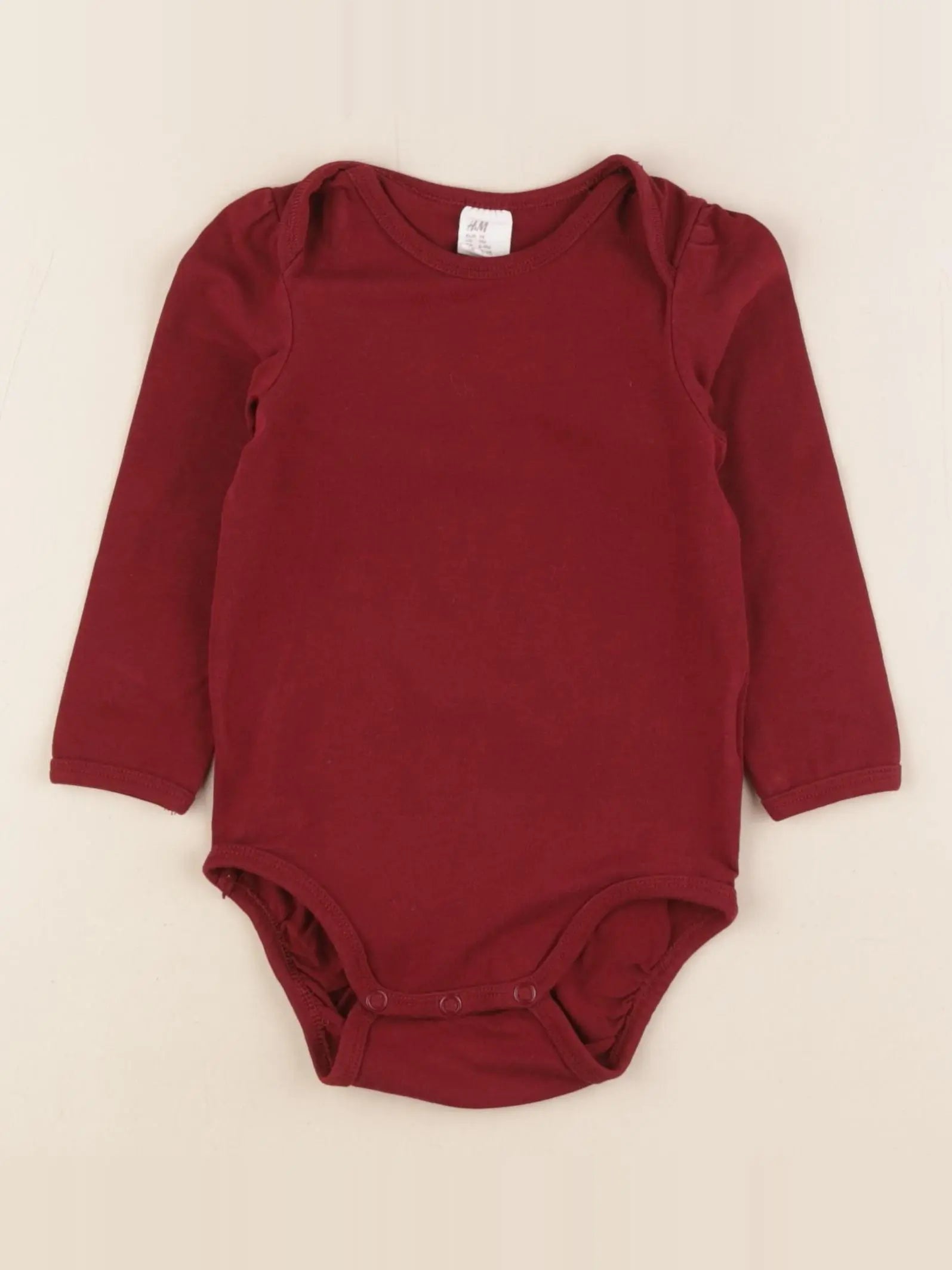 H&M - body rouge - 6/9 mois