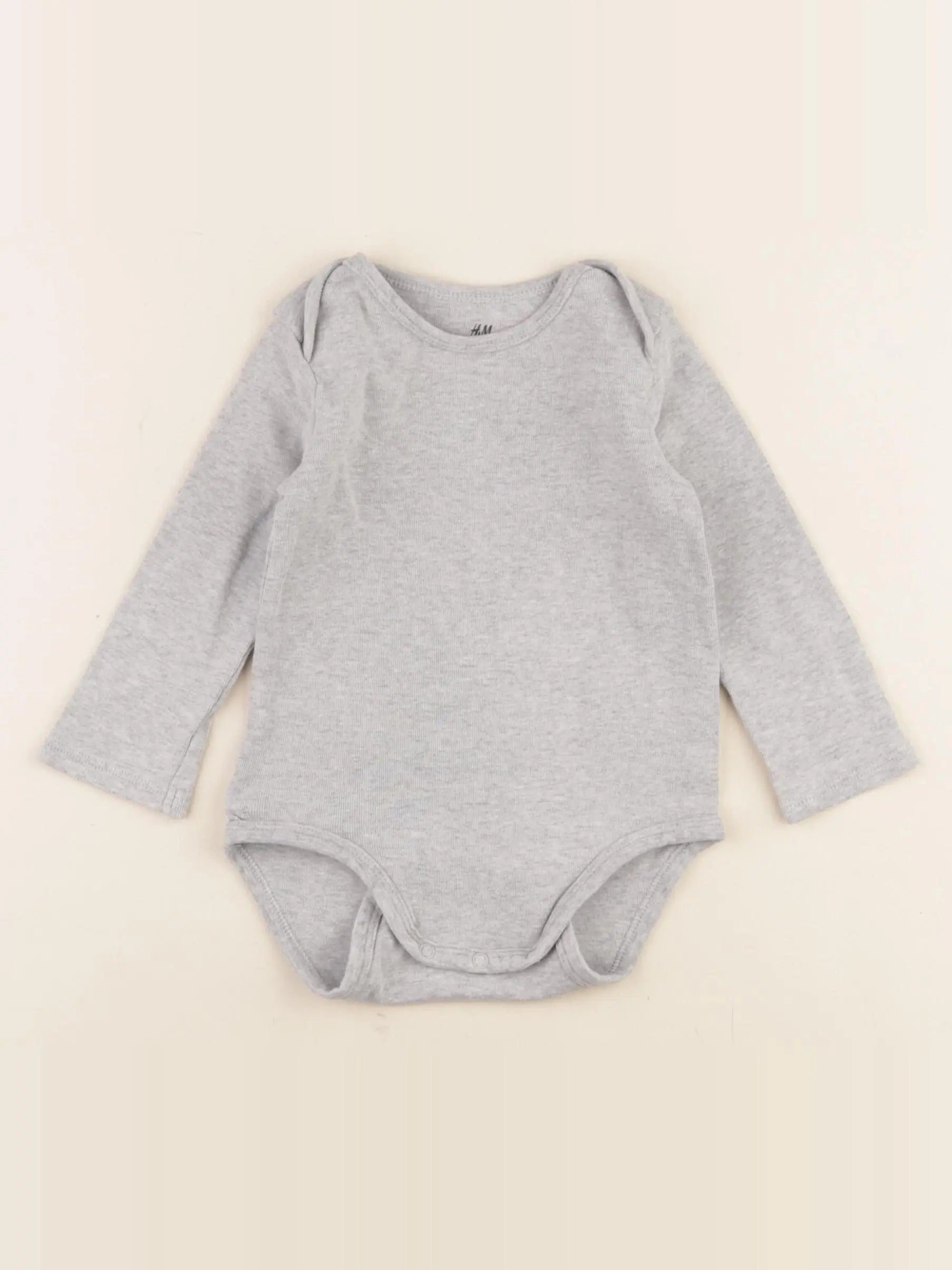H&M - body gris - 6/9 mois