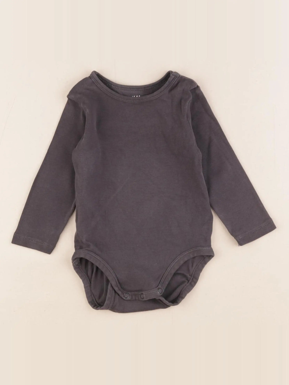 H&M - body noir - 9 mois