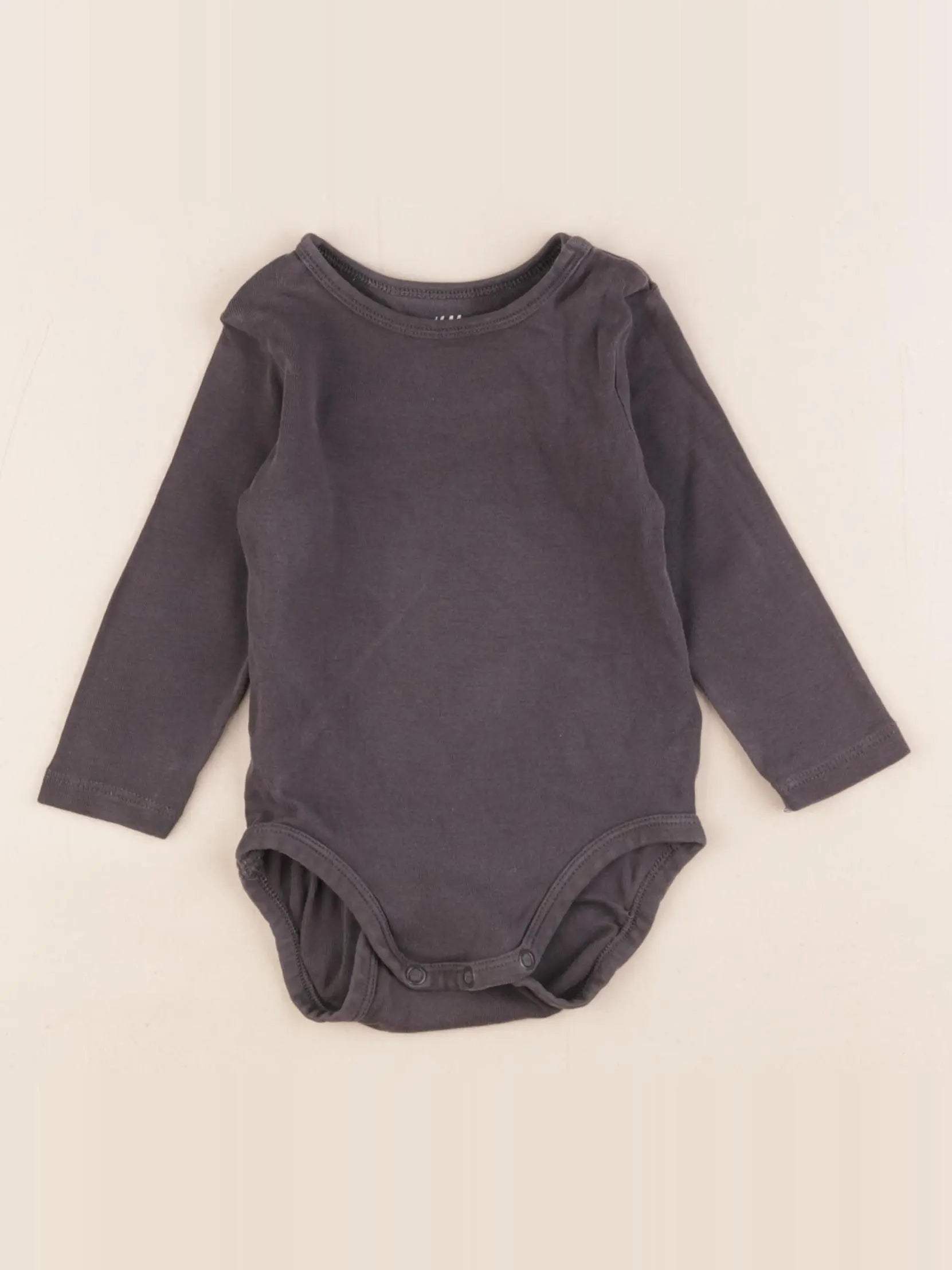 H&M - body noir - 9 mois