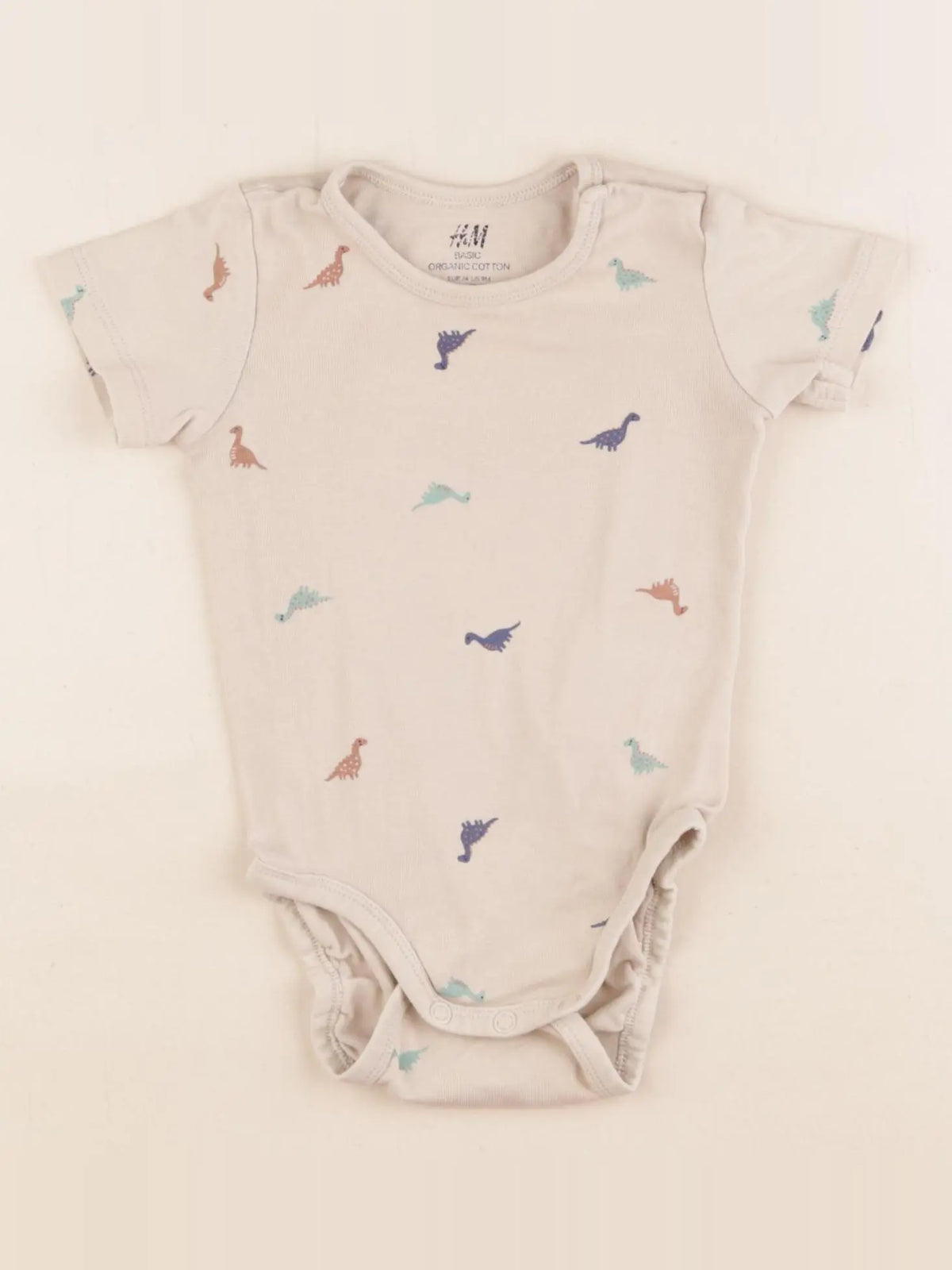 H&M - body beige - 9 mois