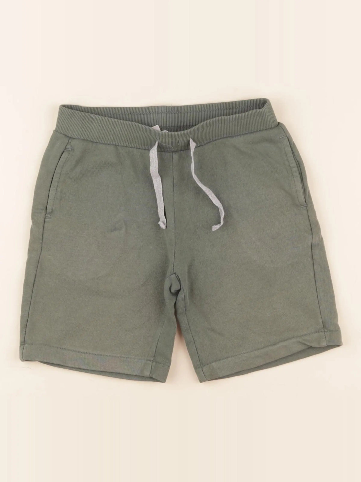 Vertbaudet - short vert - 7 ans