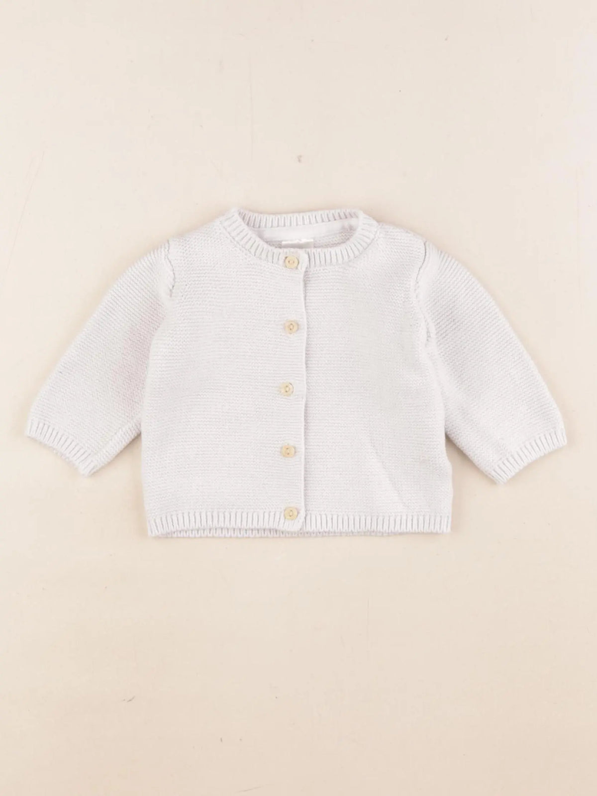 H&M - gilet blanc - 1/2 mois