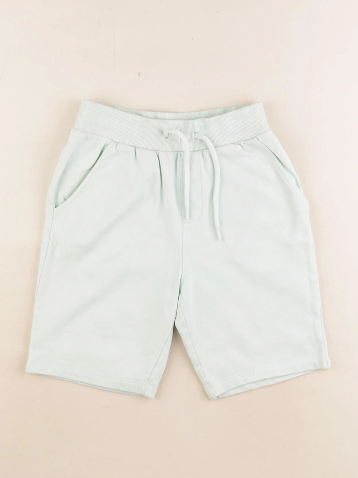 Tape à l'oeil - short vert - 9 ans