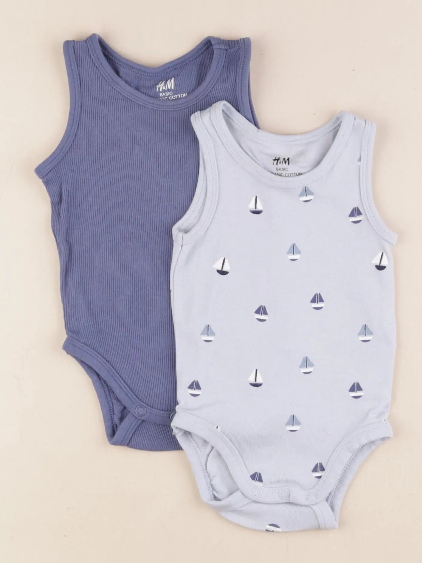 H&M - lot de 2 bodies en coton bleu - 2/4 mois