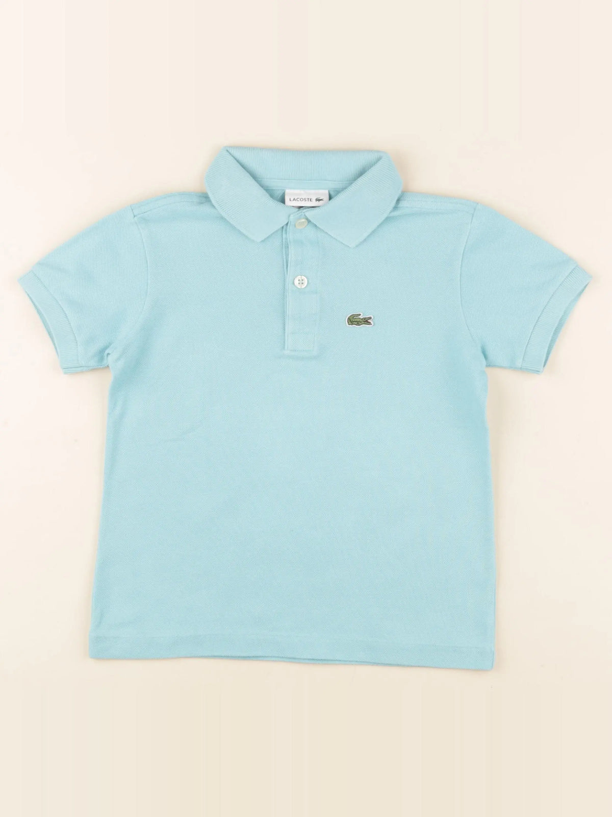 Lacoste - polo bleu - 6 ans