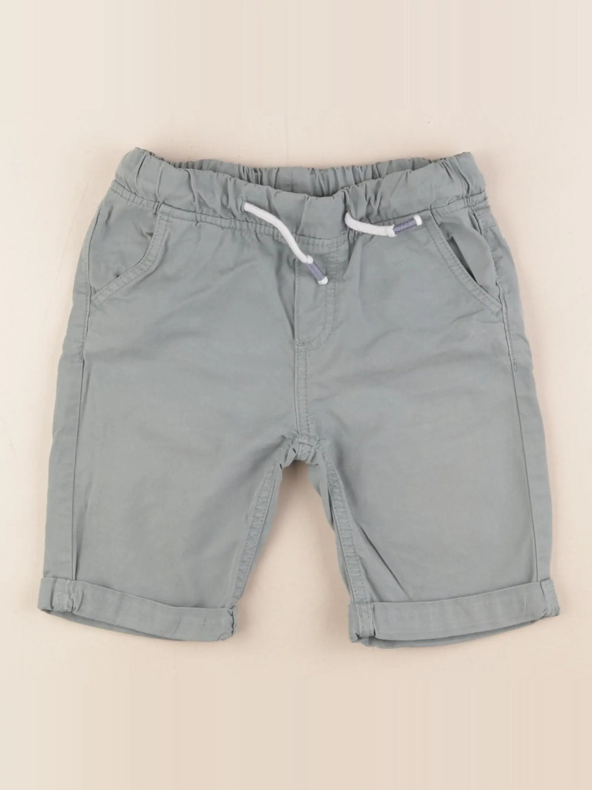 Vertbaudet - short vert - 7 ans