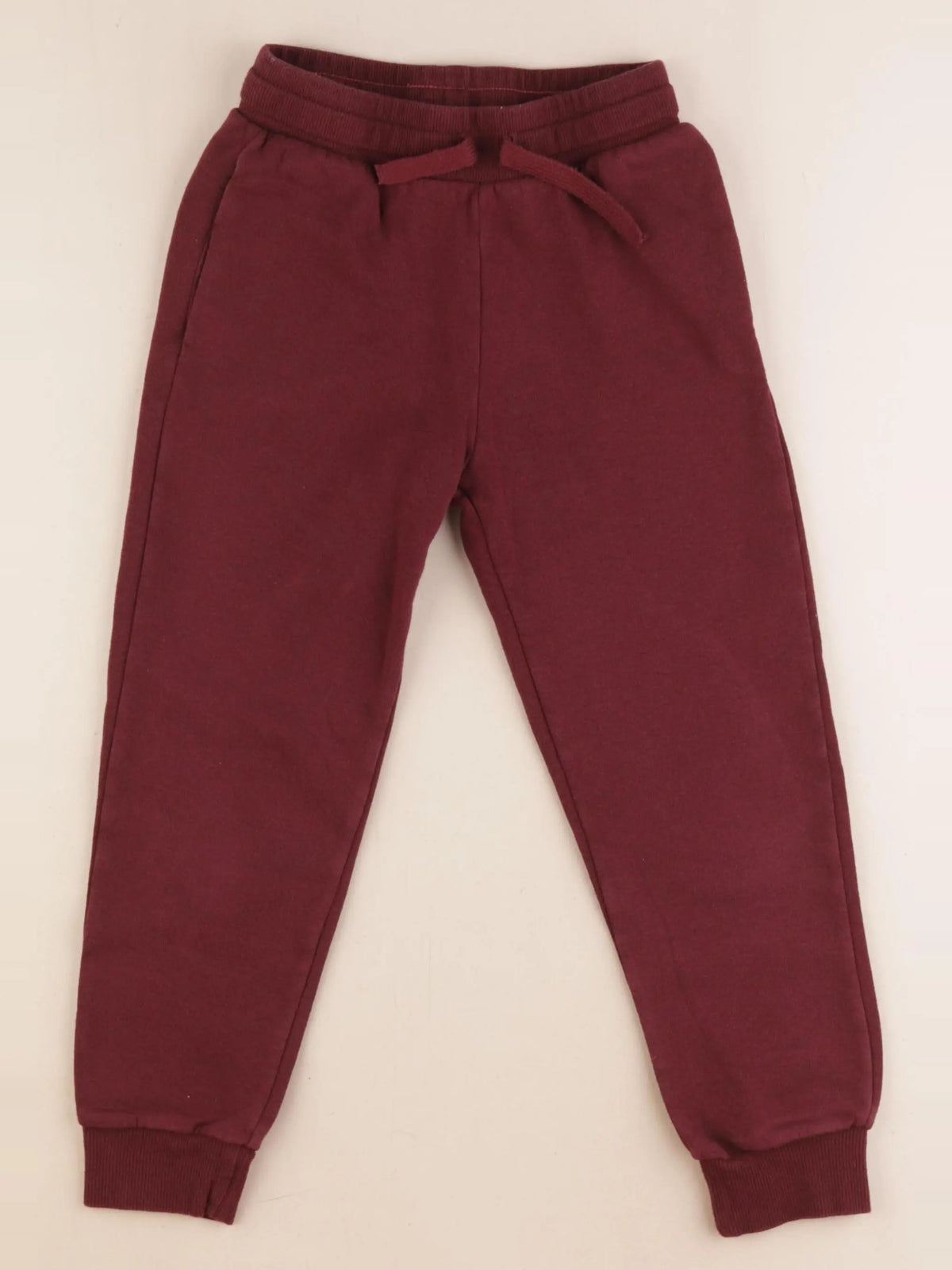 H&M - jogging rouge - 6/7 ans