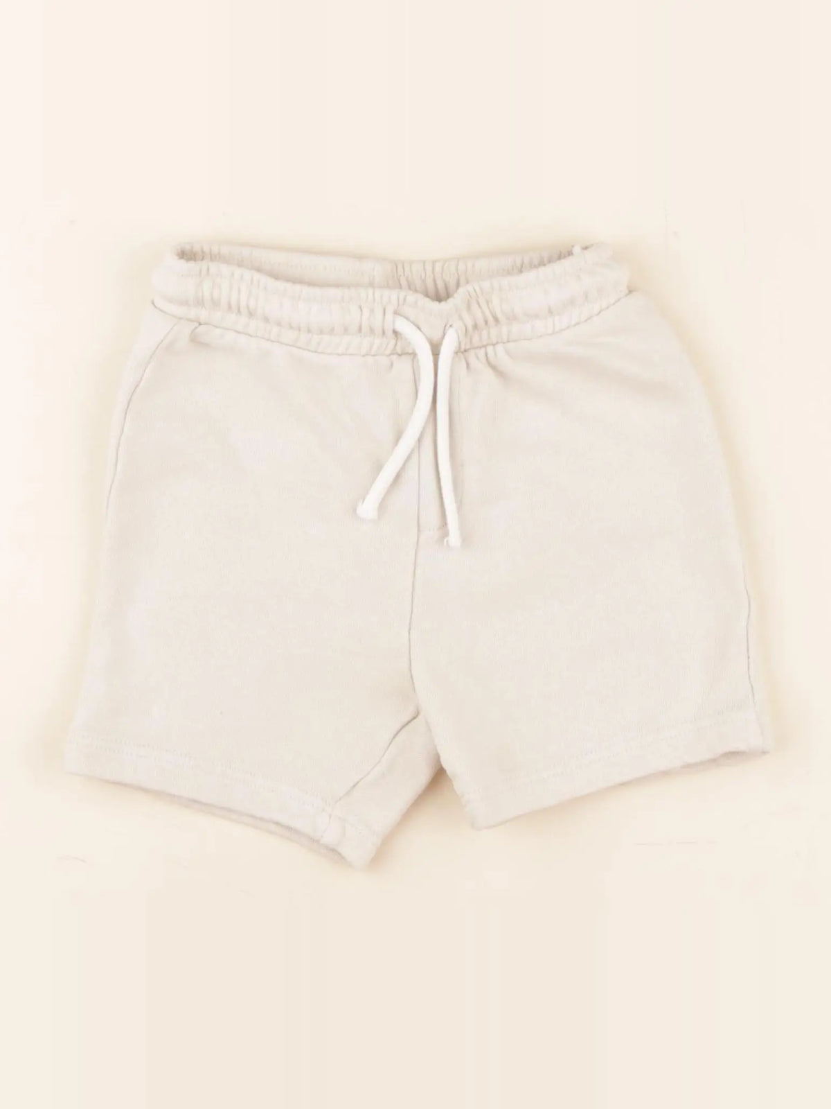H&M - short beige - 9/12 mois