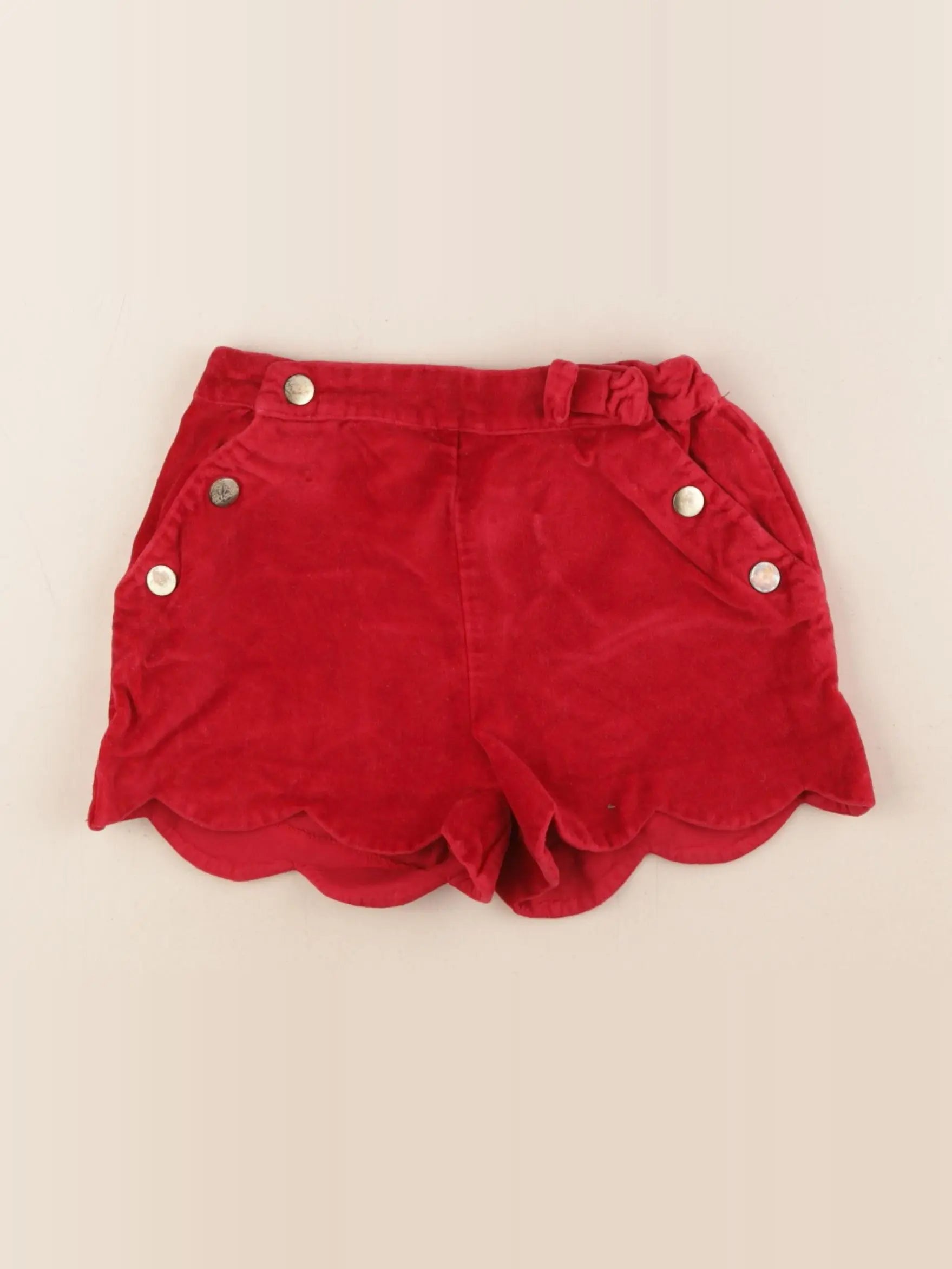 Vertbaudet - short rouge - 7 ans