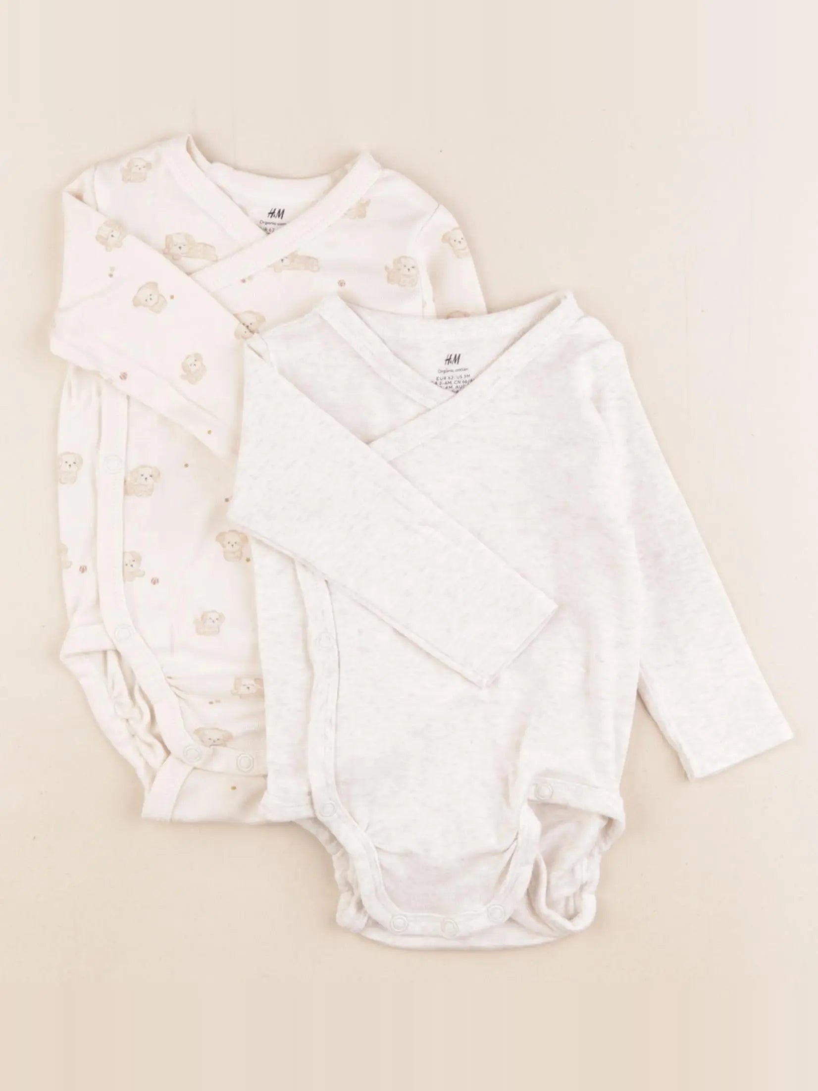 H&M - lot de 2 bodies en coton beige - 2/4 mois