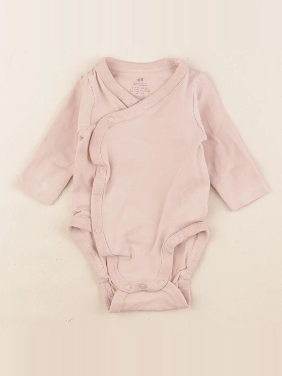 H&M - body rose - 1/2 mois