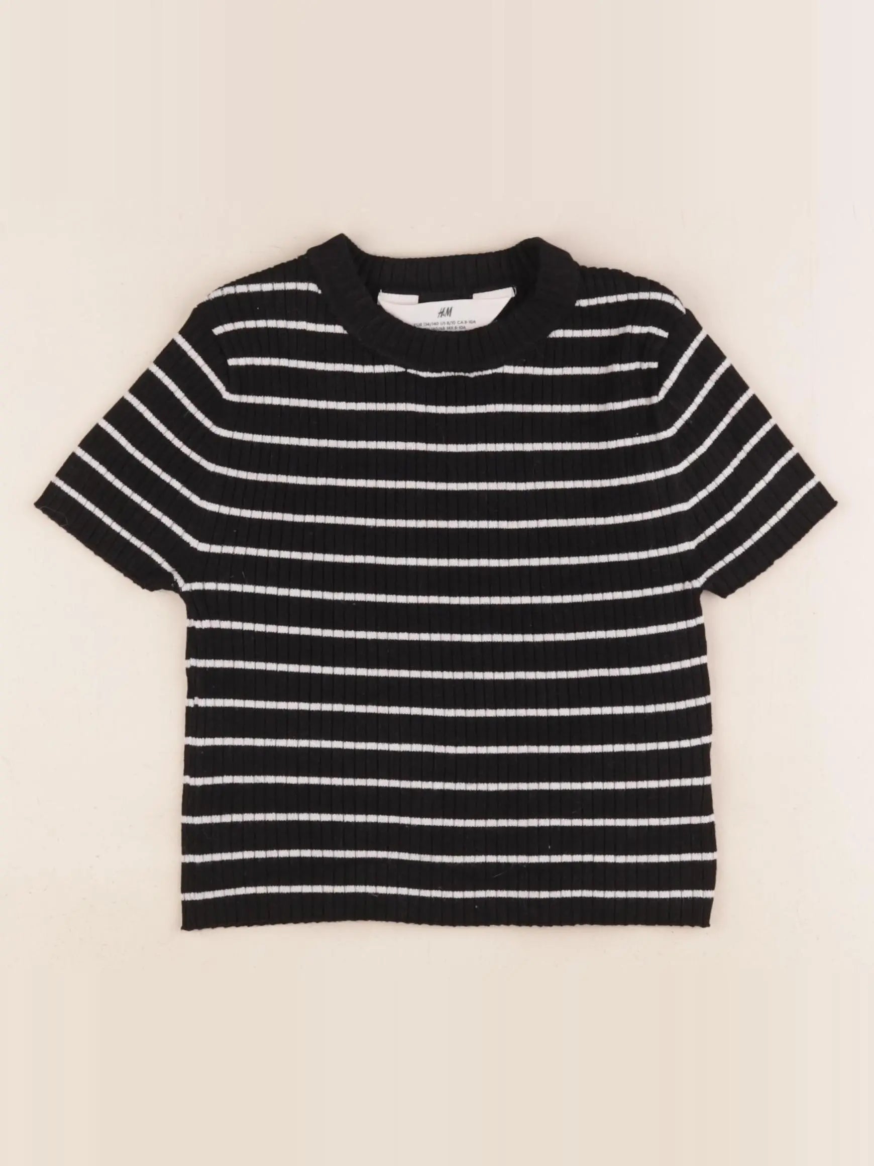 H&M - pull noir - 8/10 ans