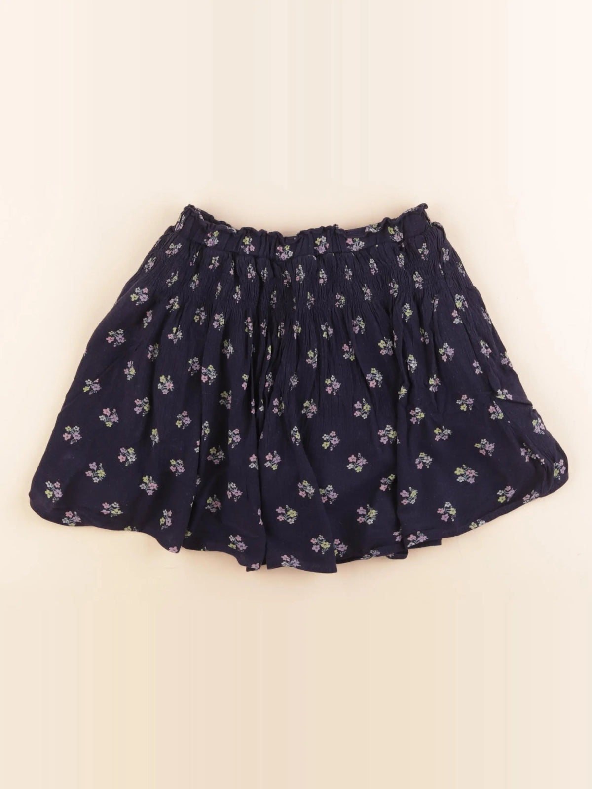 H&M - jupe short bleu - 7/8 ans