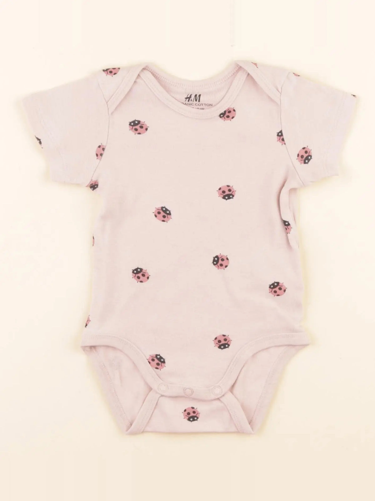 H&M - body rose - 4/6 mois