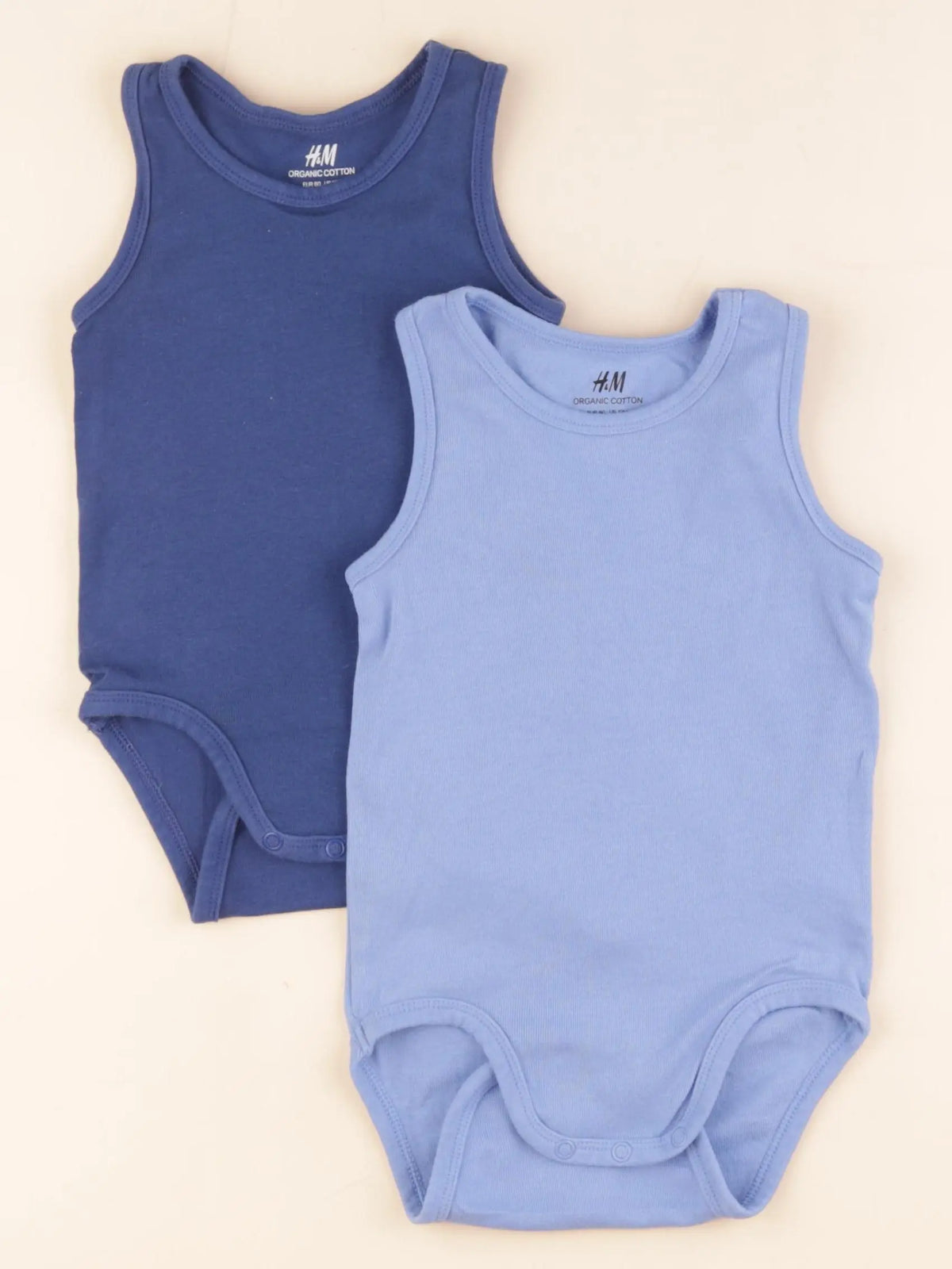 H&M - lot de 2 bodies en coton bleu - 9/12 mois