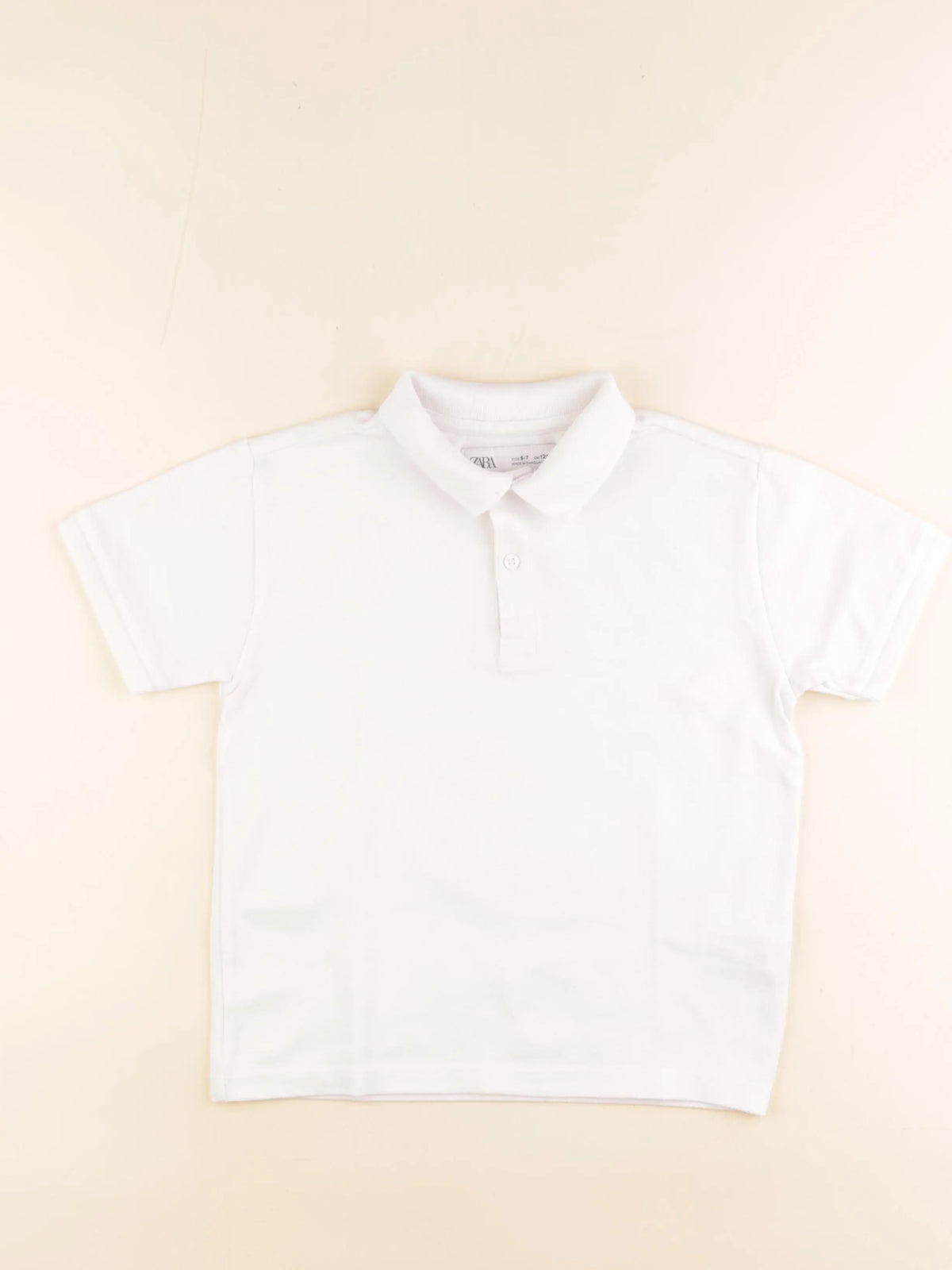 Zara - polo blanc - 6/7 ans