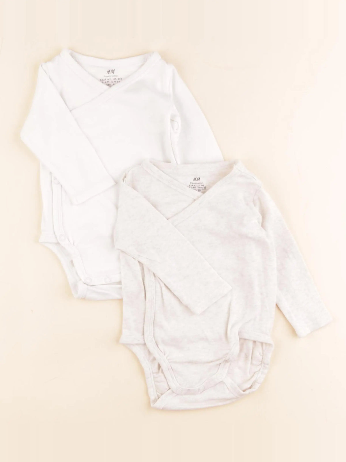H&M - lot de 2 bodies en coton beige, blanc - 2/4 mois