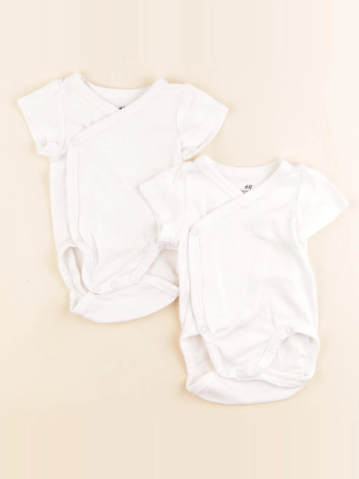 H&M - lot de 2 bodies en coton blanc - 0/1 mois