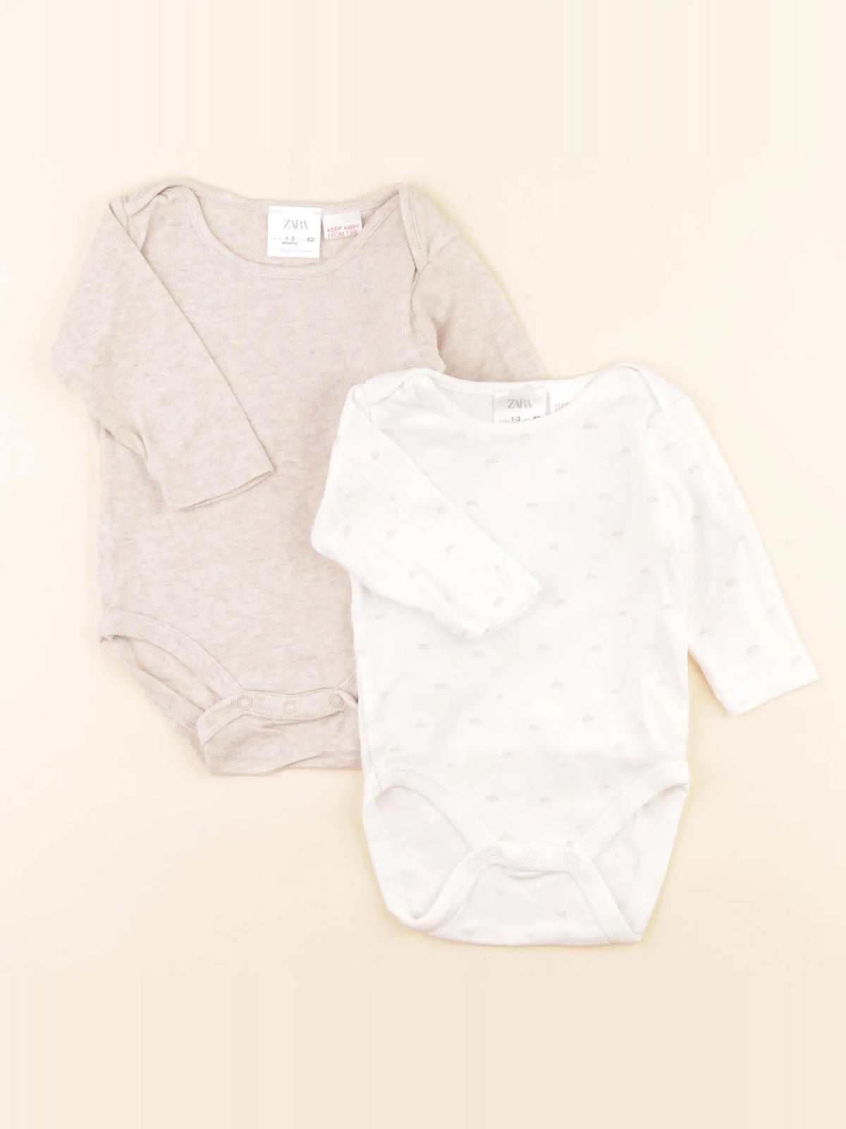 Zara - lot de 2 bodies en coton blanc, beige - 1/2 mois