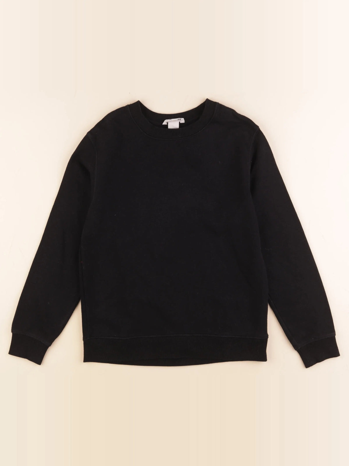 H&M - sweat noir - 8/10 ans