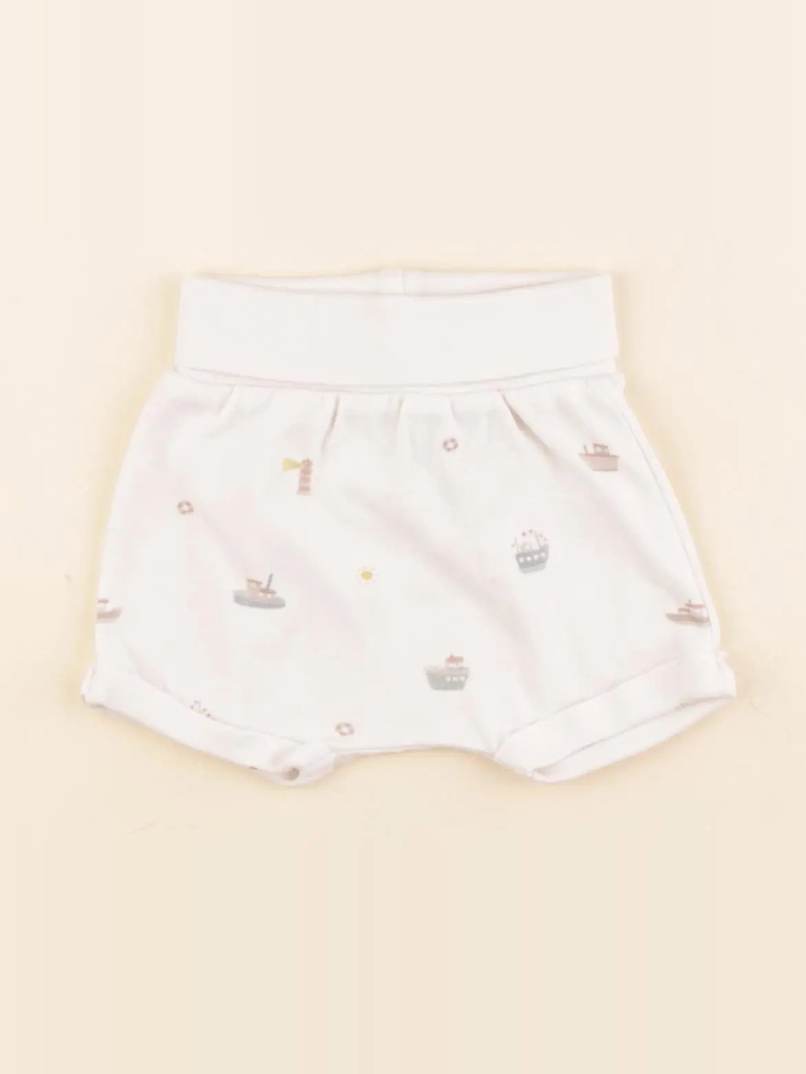 H&M - short beige - 1/2 mois