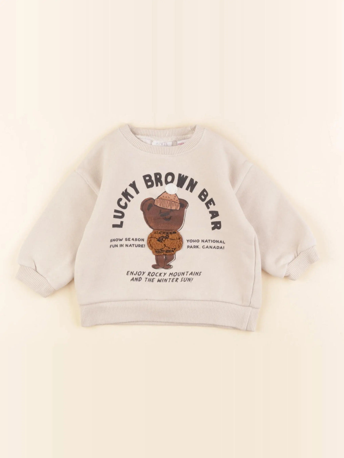 Zara - sweat beige - 6/9 mois