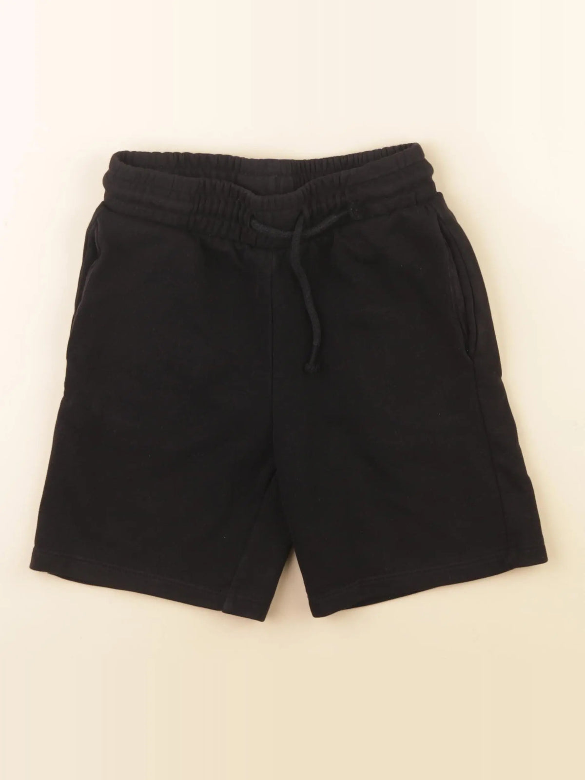 H&M - short noir - 6/7 ans